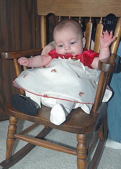 DSC_0995_edited-1.jpg - Look at me in my Christmas dress and in my rocking chair.